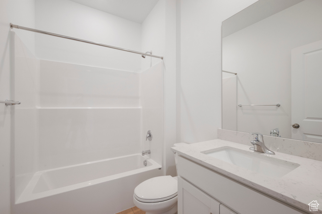 Bathroom featuring vanity and bathing tub / shower combination