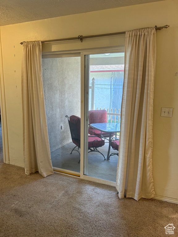 Dining room with carpet flooring
