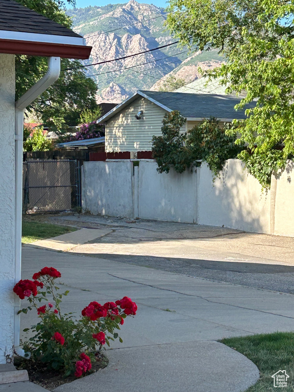 View of property exterior with a mountain view