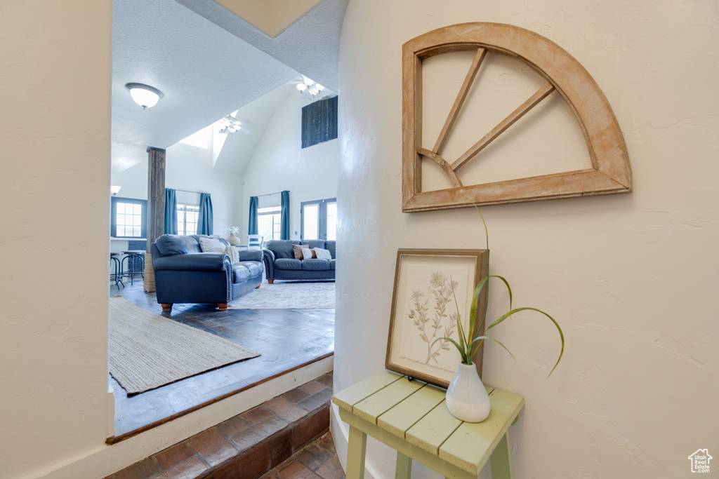Hallway with vaulted ceiling