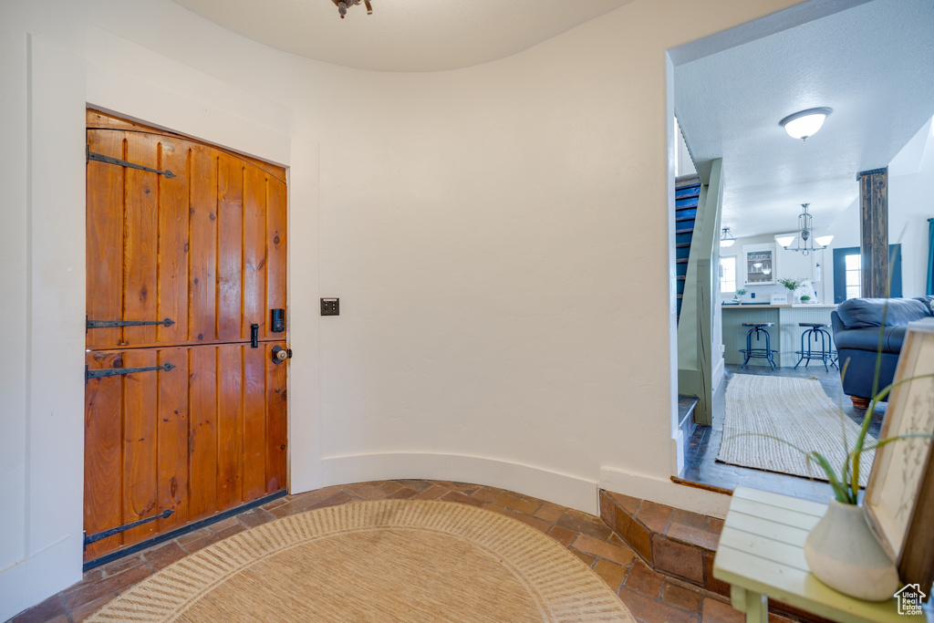 Entryway featuring stone tile floors