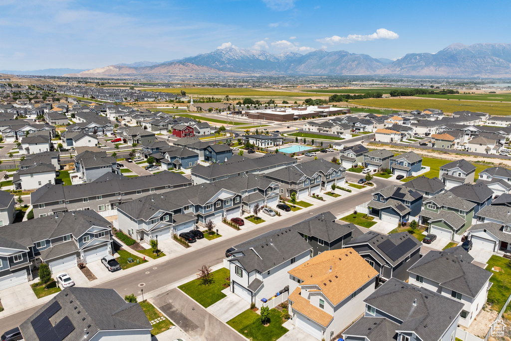 Aerial view of residential area with a mountainous background