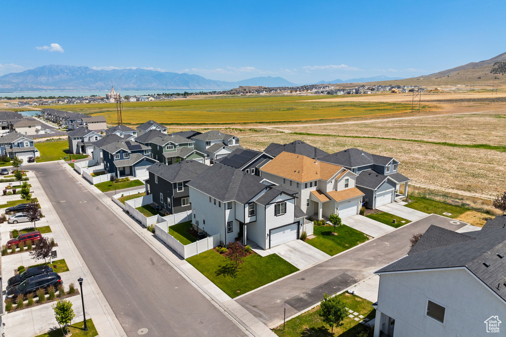 Aerial view of residential area with a mountain backdrop