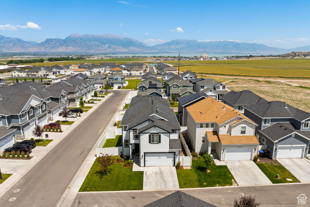 Aerial view of residential area with mountains