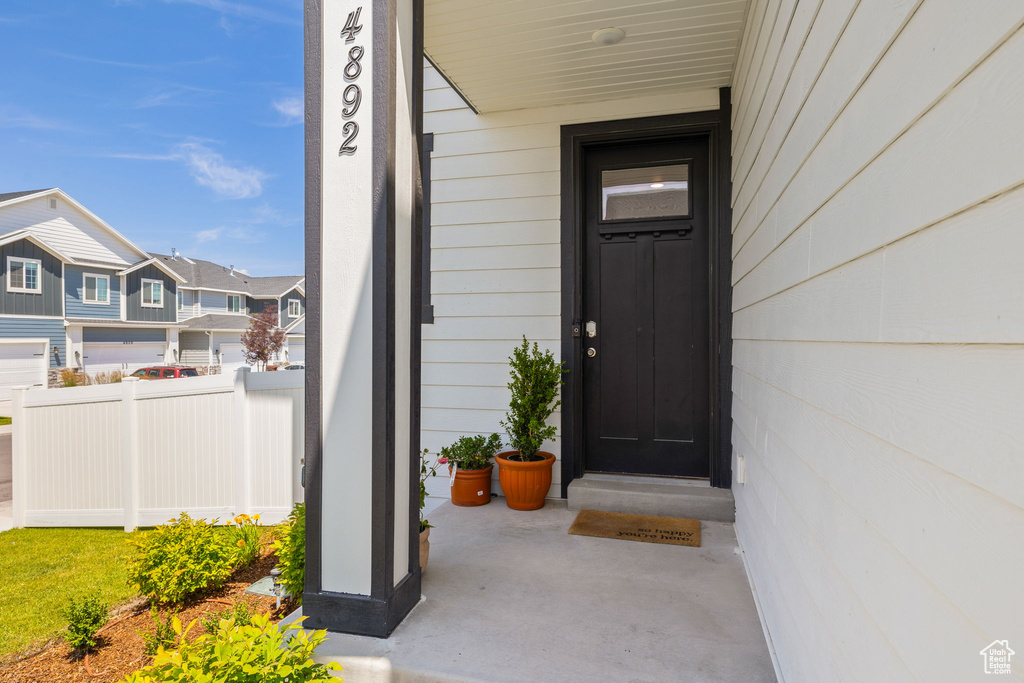 Doorway to property with a residential view