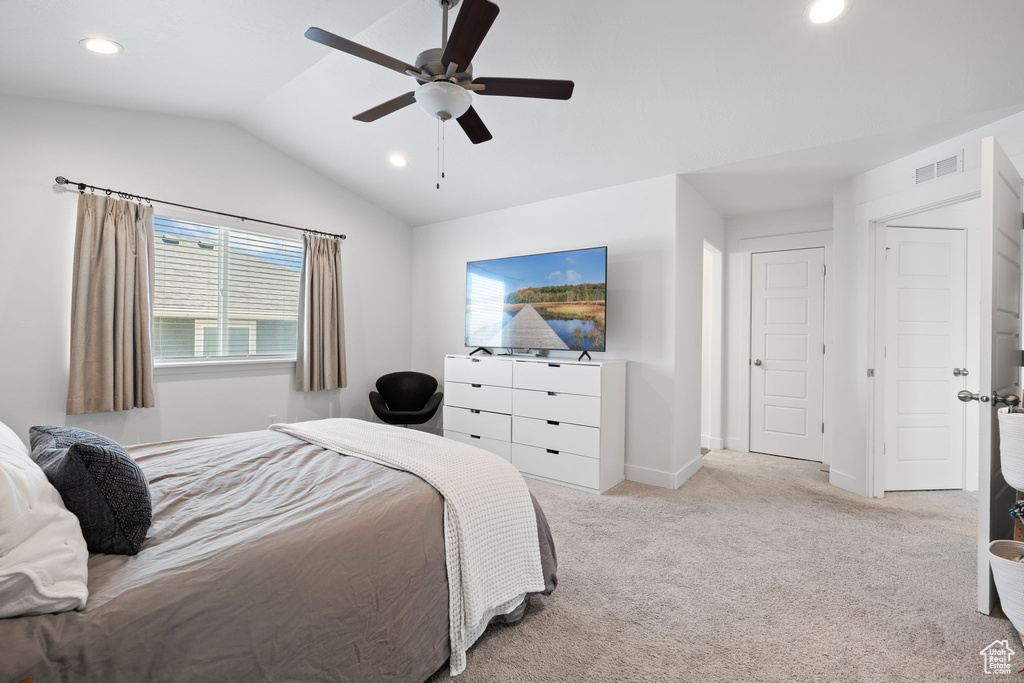 Bedroom with lofted ceiling, carpet, recessed lighting, and ceiling fan