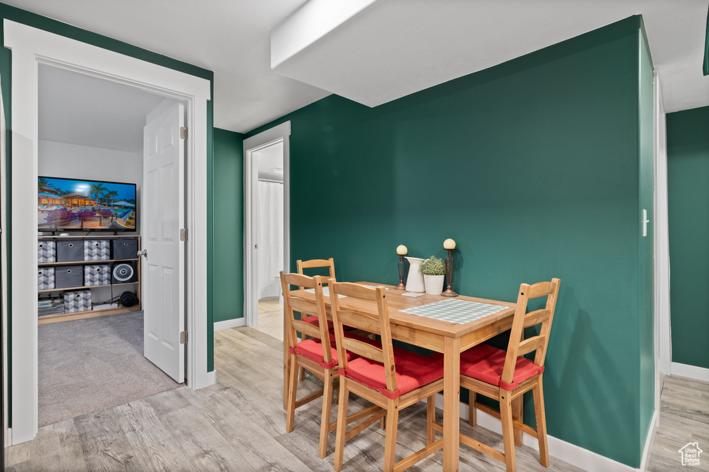 Dining space featuring light wood-style floors