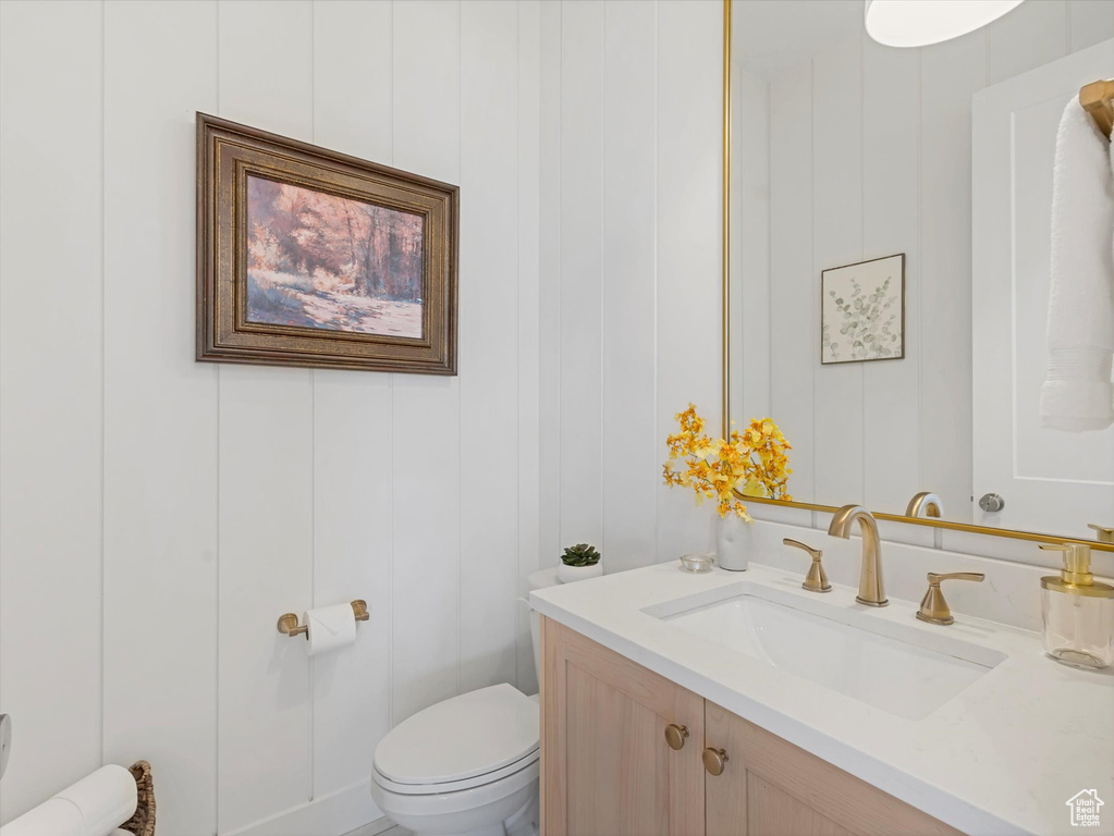 Bathroom with toilet and vanity