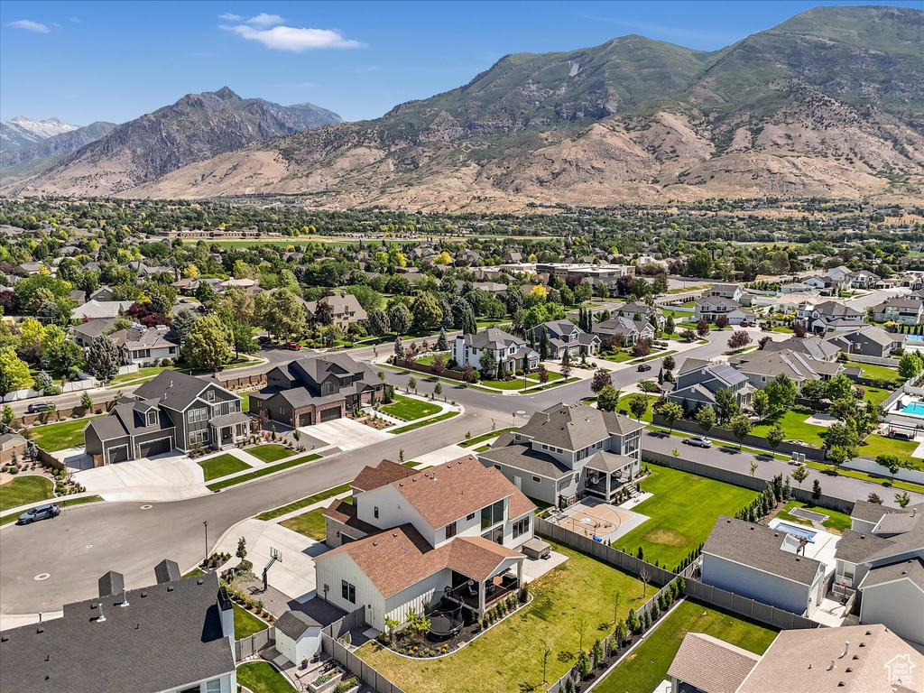 Aerial perspective of suburban area featuring mountains