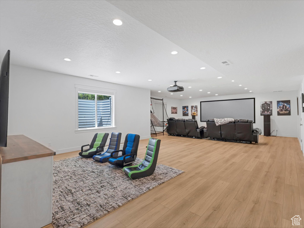 Playroom featuring recessed lighting and light wood-type flooring