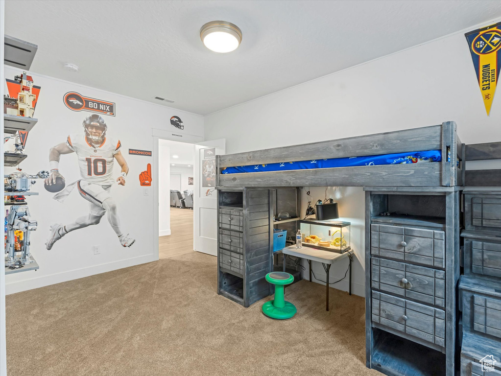 Bedroom with carpet flooring