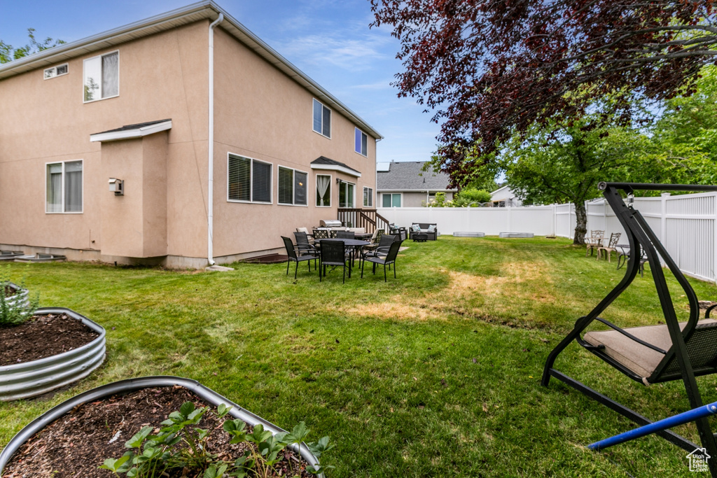 View of fenced backyard