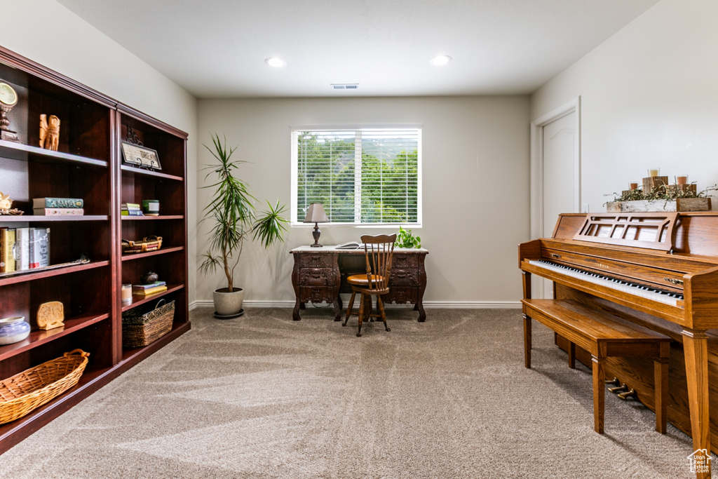 Carpeted office featuring baseboards and recessed lighting