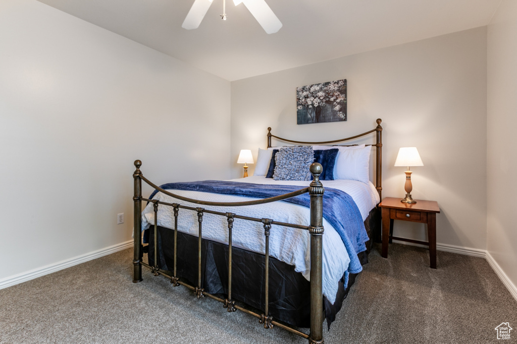 Bedroom featuring carpet floors and a ceiling fan