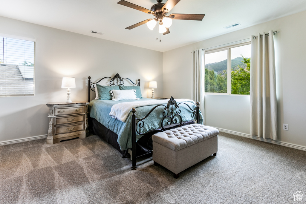 Bedroom with carpet flooring and ceiling fan