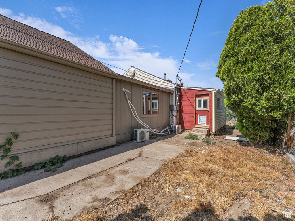 View of yard with entry steps