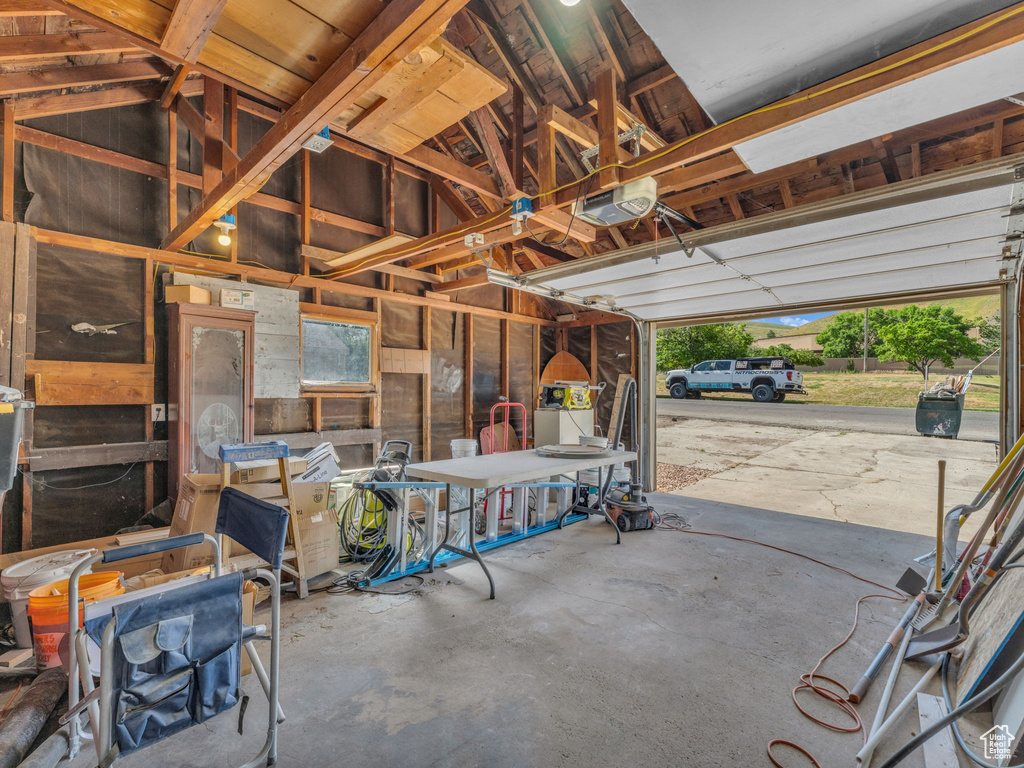Garage featuring a garage door opener