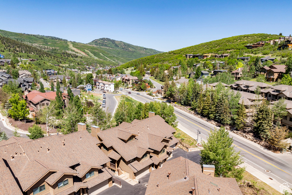 Aerial view of residential area with a mountainous background