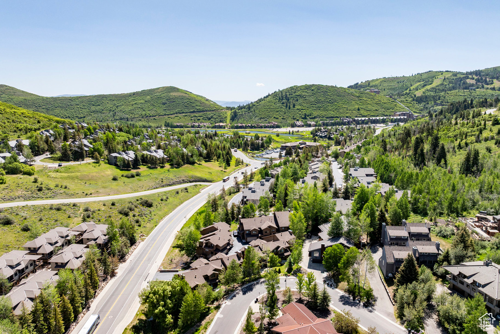 Aerial view of residential area with mountains