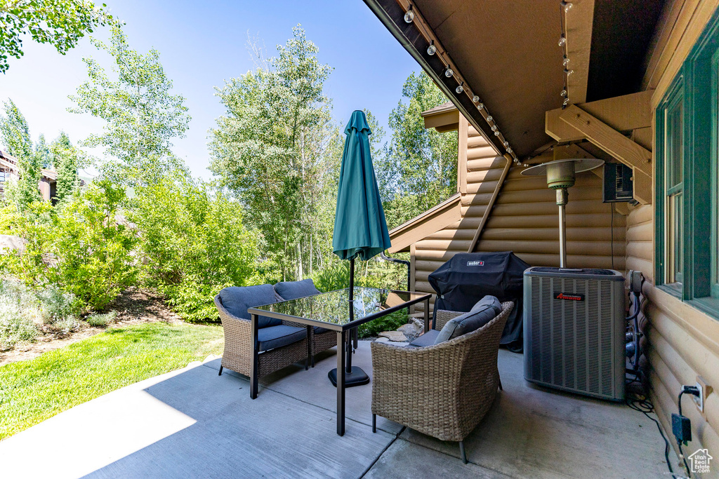 View of patio / terrace with grilling area and outdoor dining area