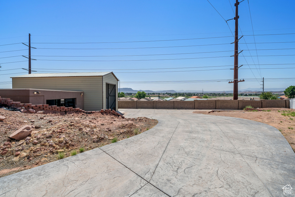 View of concrete surface with a mountain view