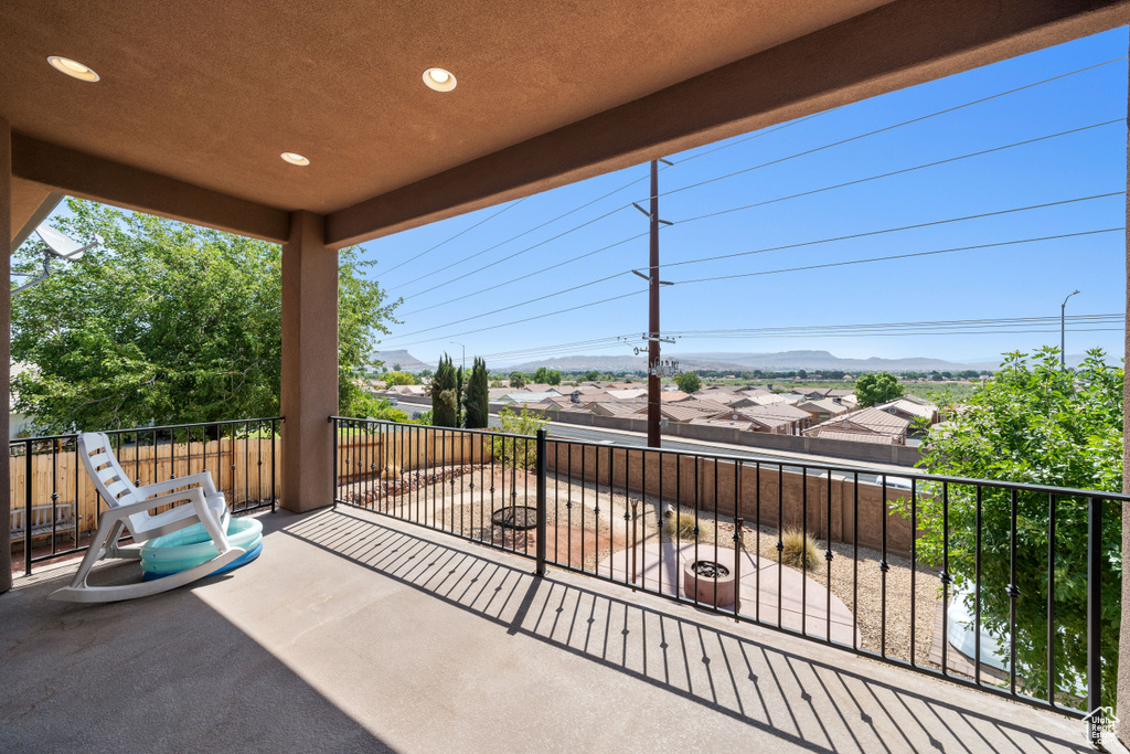 Patio / terrace featuring a mountain view and a residential view
