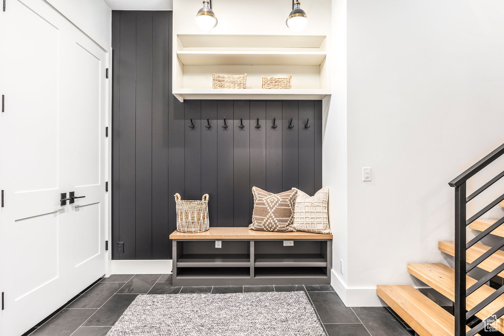 Mudroom featuring baseboards
