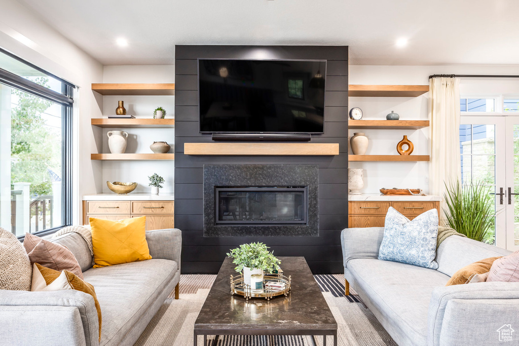 Living room featuring a fireplace and wood finished floors