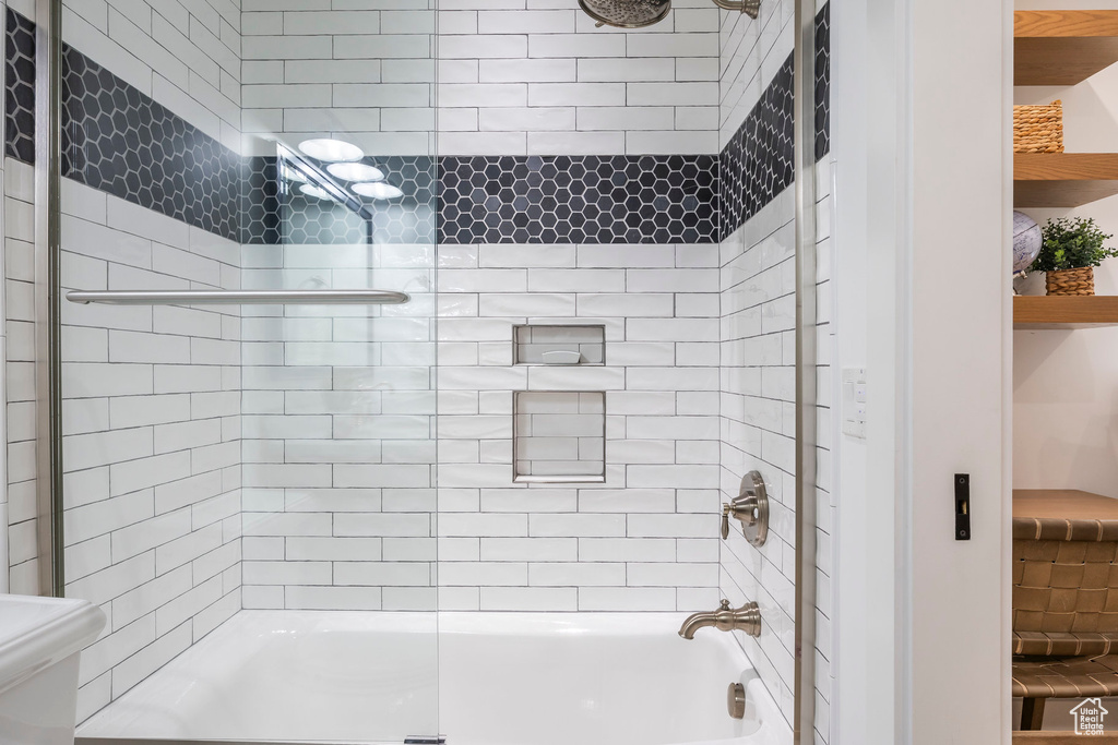 Full bathroom with shower / washtub combination