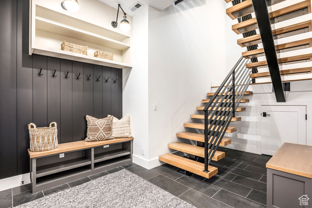 Mudroom featuring baseboards