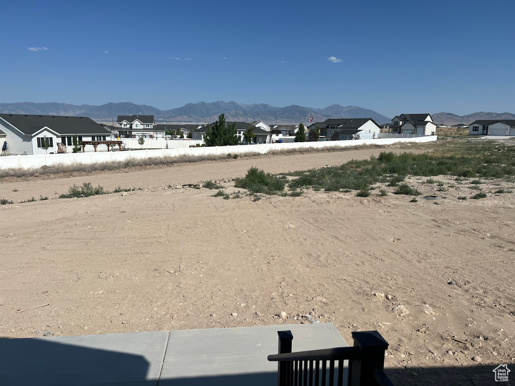 View of yard featuring a mountain view and a residential view