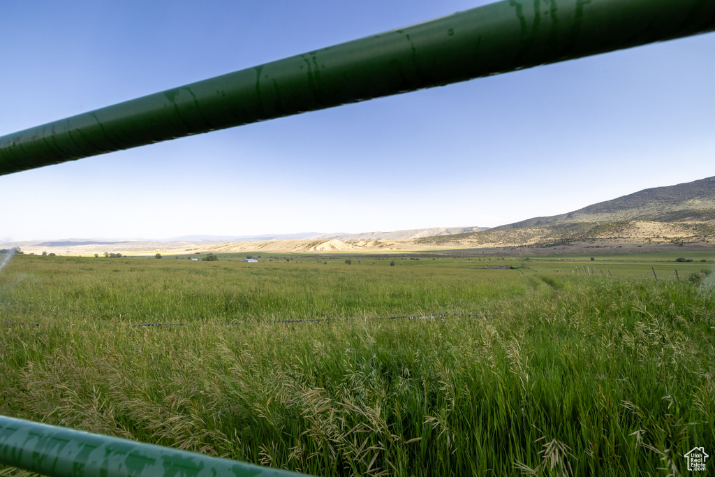 View of yard with a view of countryside and a mountain view