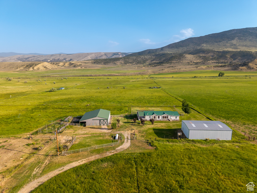 Overview of rural landscape with a mountainous background