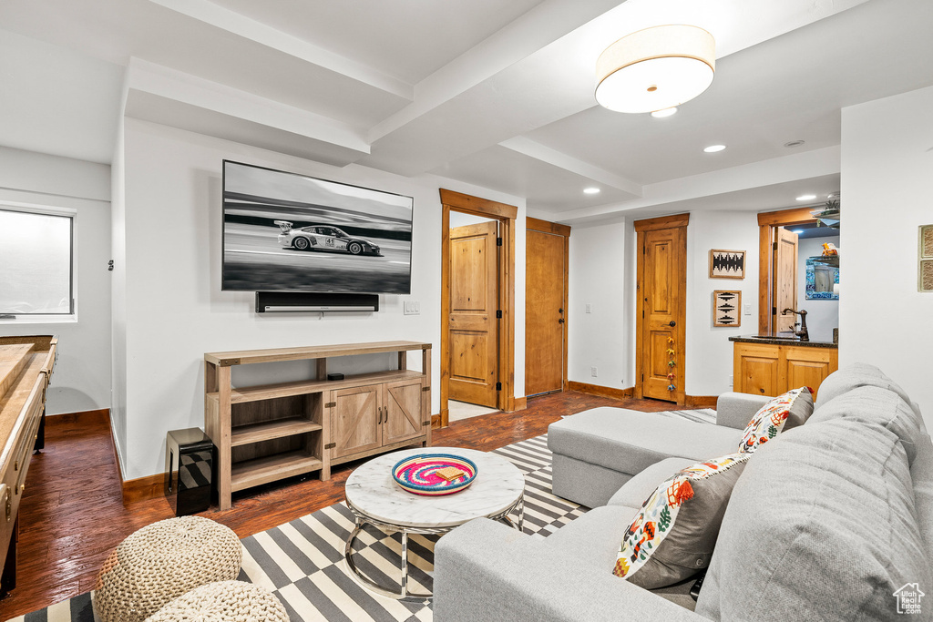 Living area with recessed lighting and wood finished floors