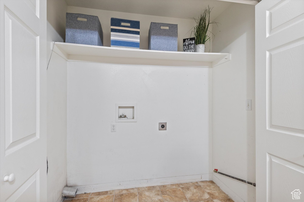 Laundry area with washer hookup and electric dryer hookup