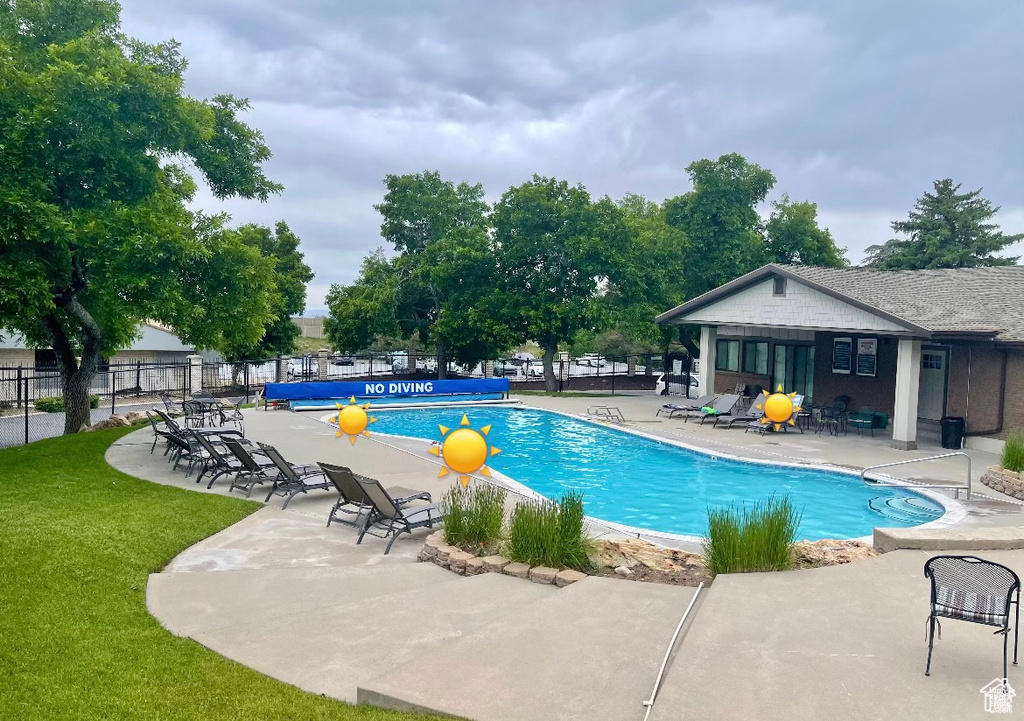 View of pool with a patio area