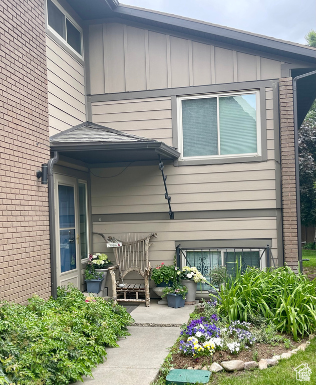 View of side of property with board and batten siding