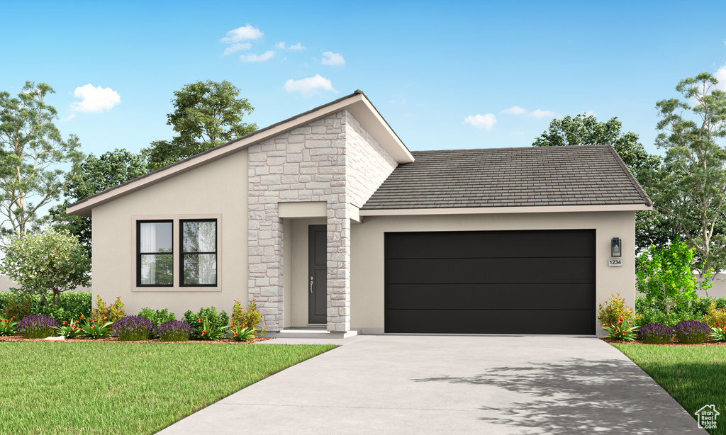 View of front facade with stone siding, an attached garage, driveway, and stucco siding