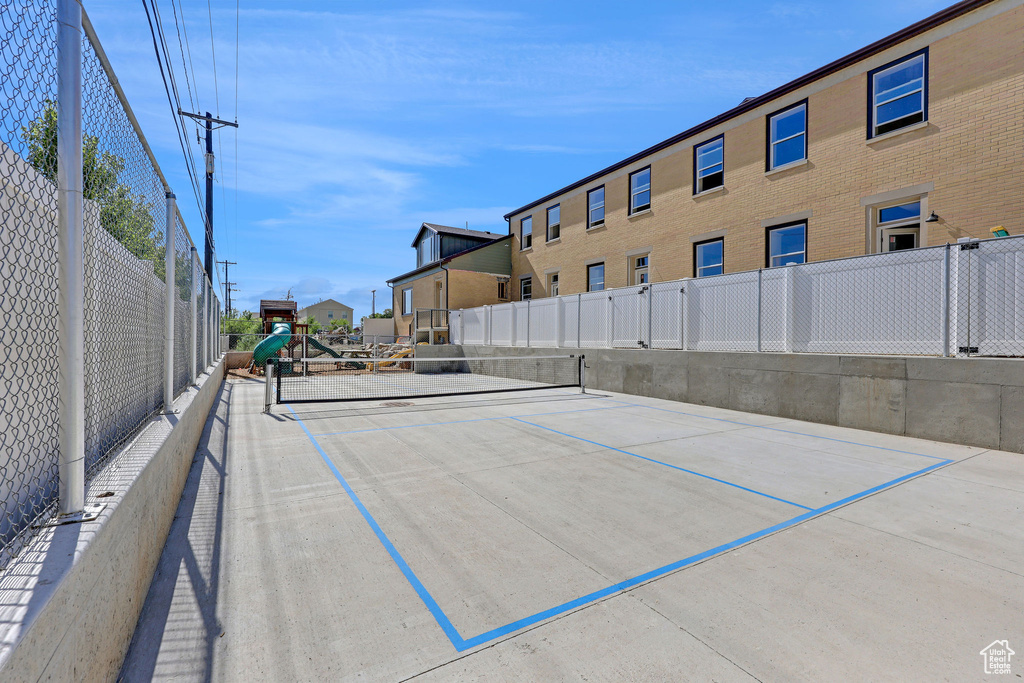 Surrounding community with a tennis court