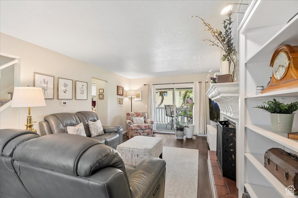 Living area featuring dark wood finished floors