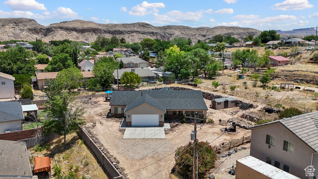 Aerial perspective of suburban area with mountains