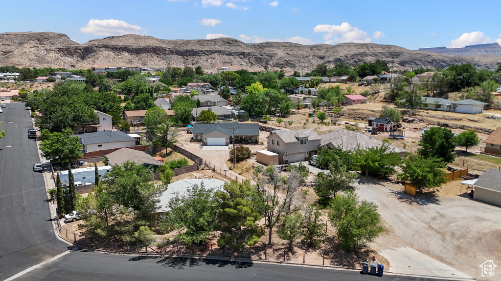 Aerial view of residential area featuring mountains