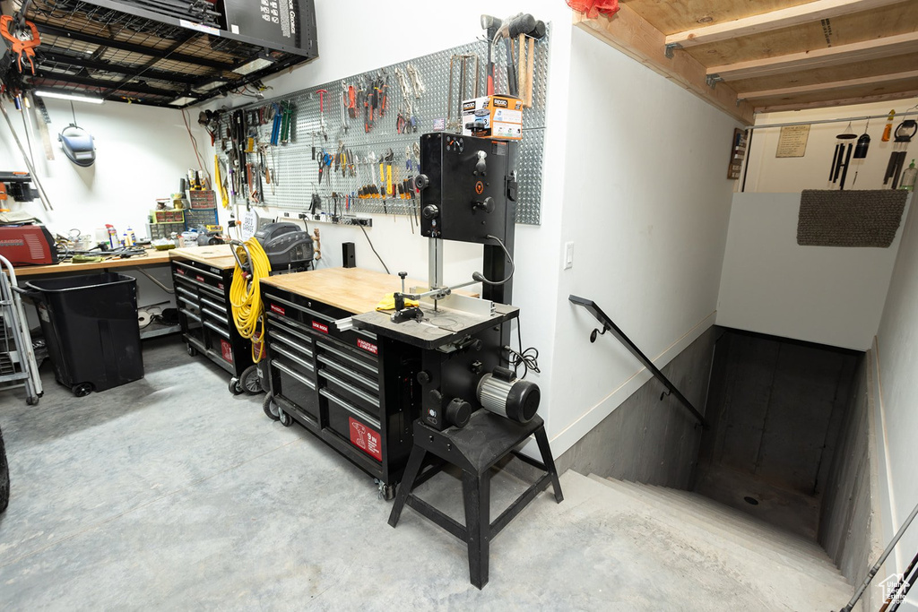 Below grade area with a workshop area