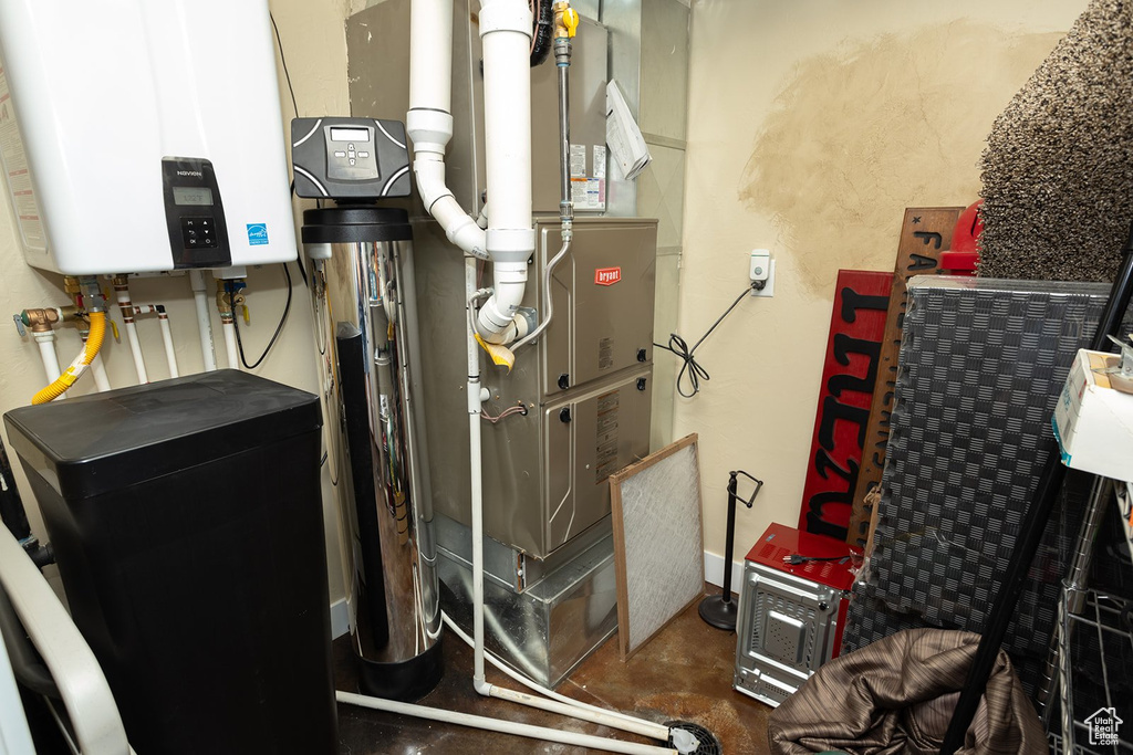 Utilities featuring tankless water heater