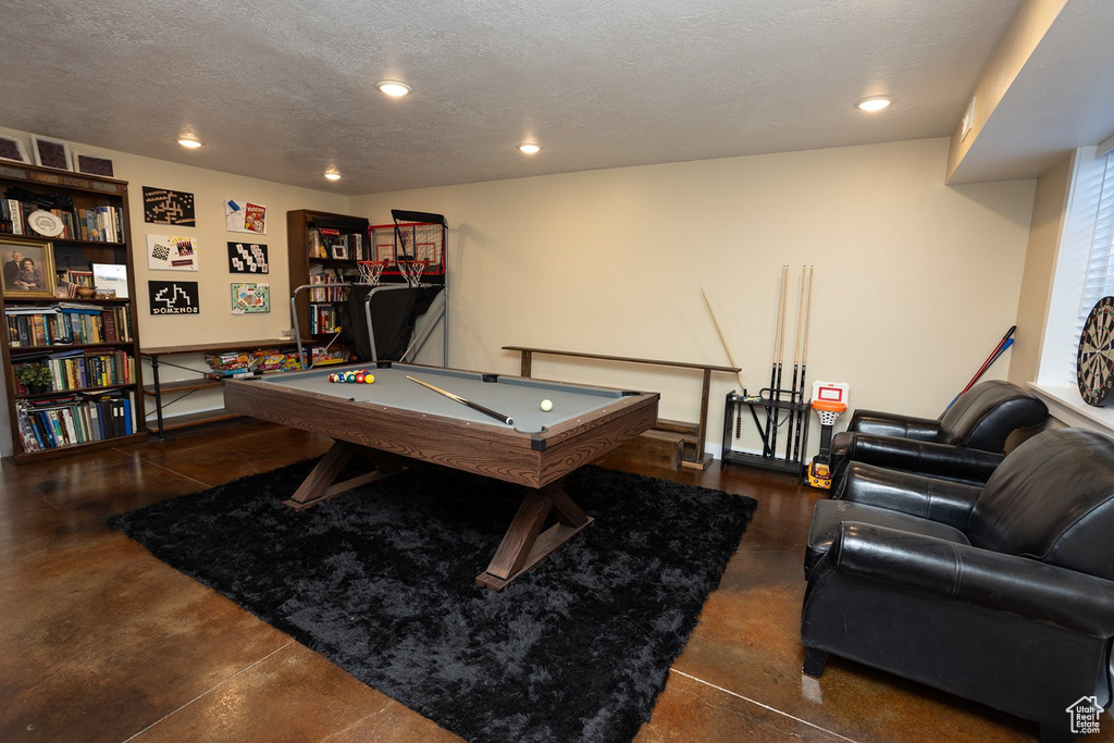 Playroom featuring billiards, recessed lighting, a textured ceiling, and finished concrete flooring