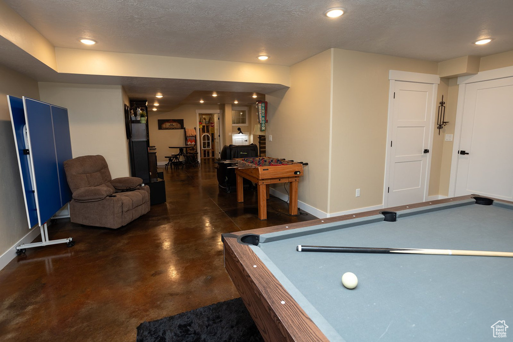 Playroom featuring billiards table, finished concrete floors, recessed lighting, and a textured ceiling