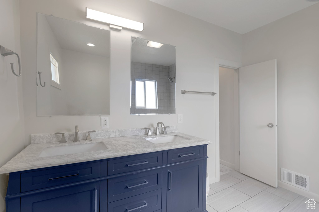 Full bathroom with double vanity
