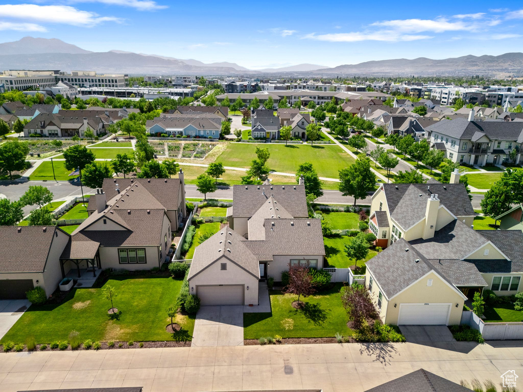 Aerial view of residential area featuring mountains