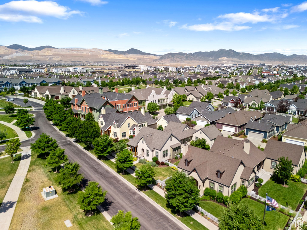 Aerial view of residential area with mountains