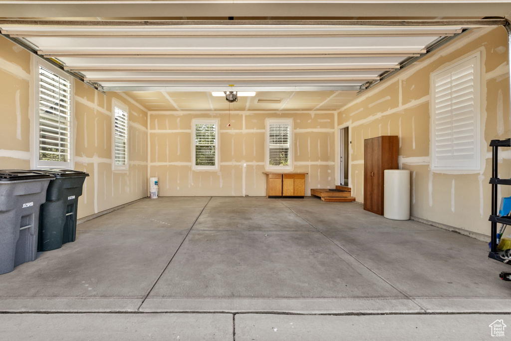 Garage featuring a garage door opener